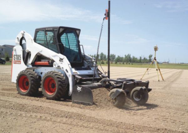Bobcat: S185 mit Planierkasten Bobcat: S185 mit Planierkasten